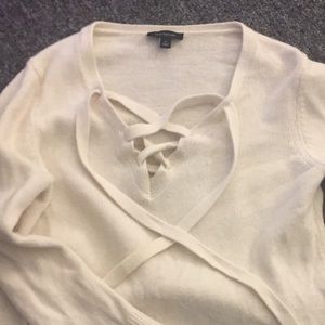 Bell sleeve lace up sweater